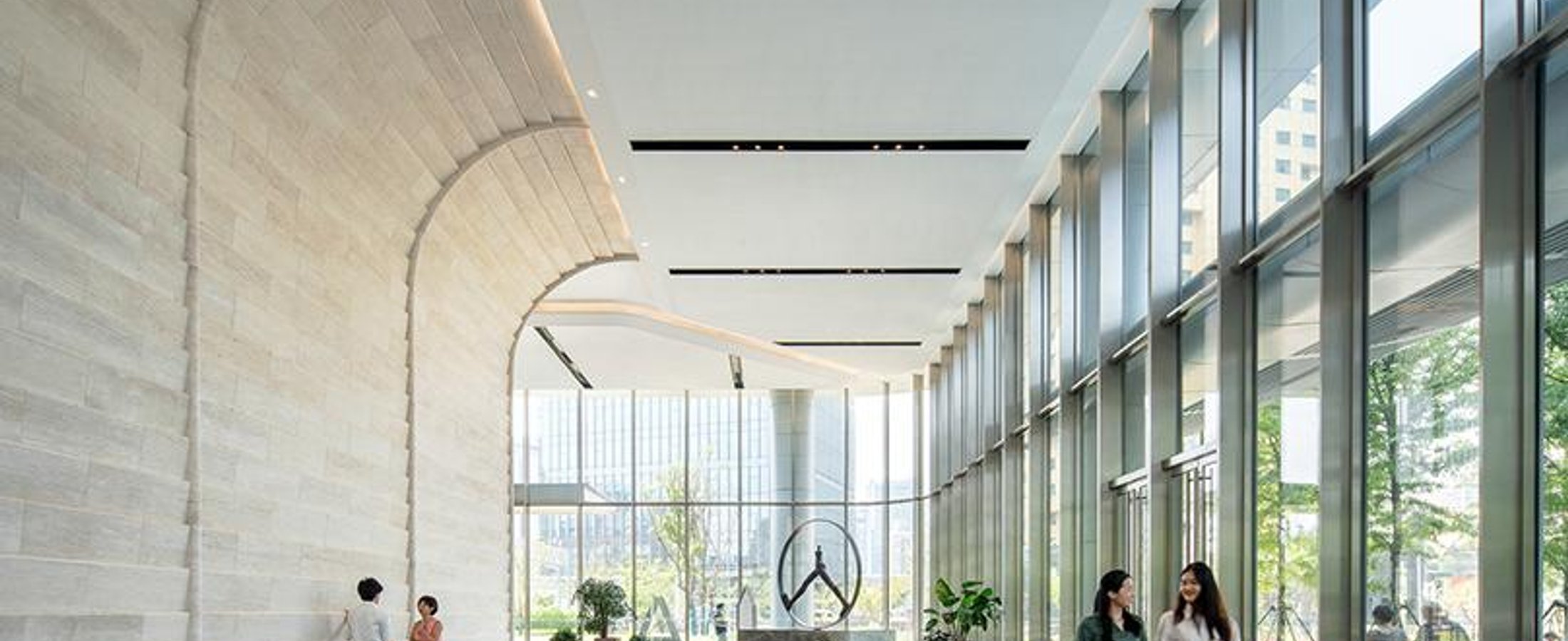 People walking through a commercial office lobby